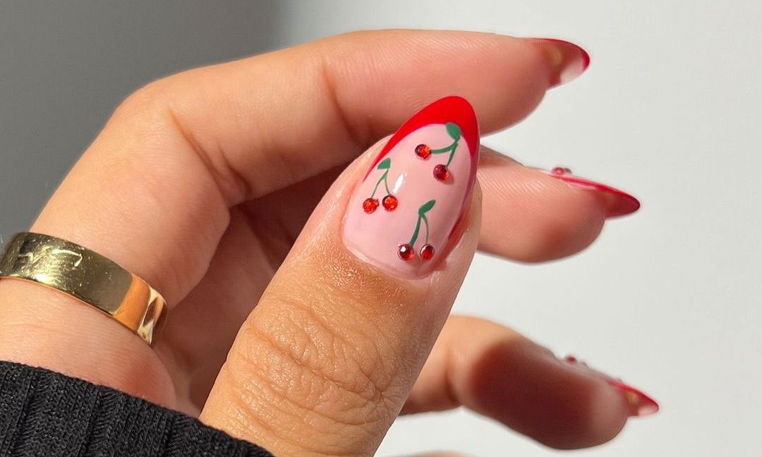 cherry manicure with nail stickers