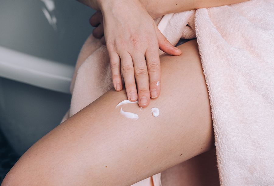body lotion on leg