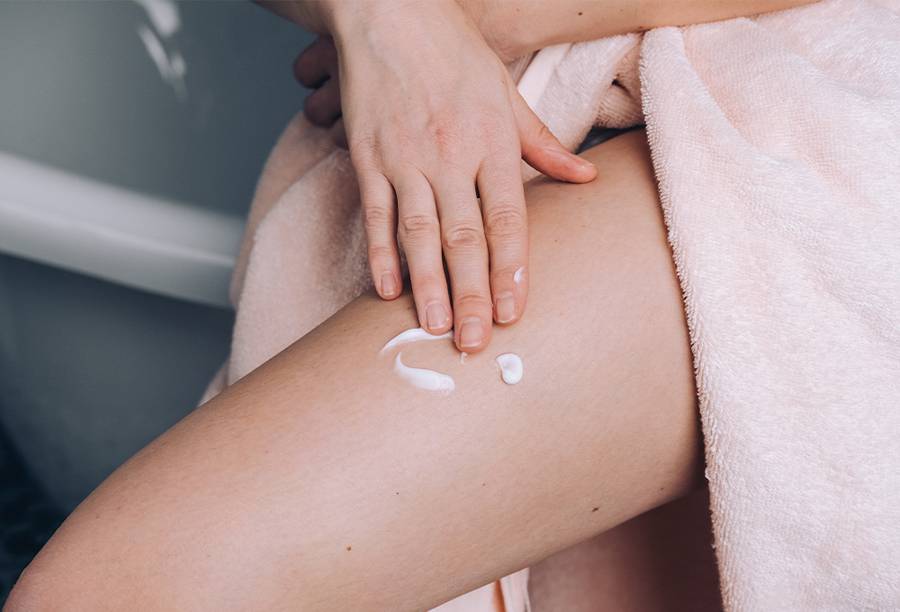 body lotion on leg