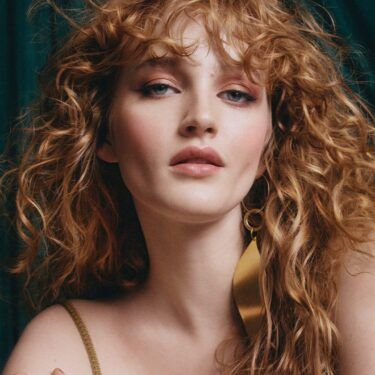 Loose curly bangs and long hair