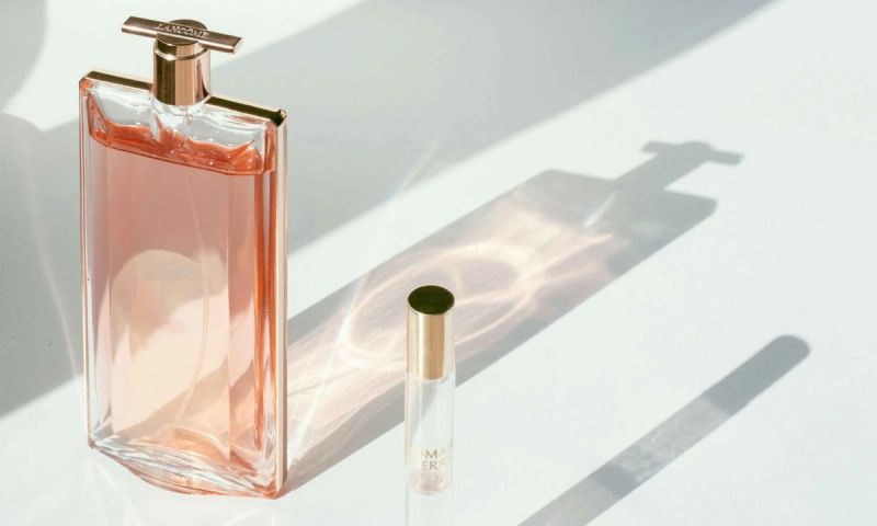 two fragrance bottles and shadows