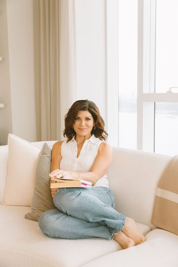 Tamsen Fadal sitting on a couch