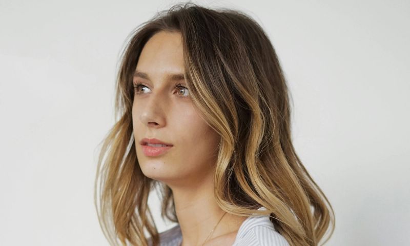 young woman looking off to the side