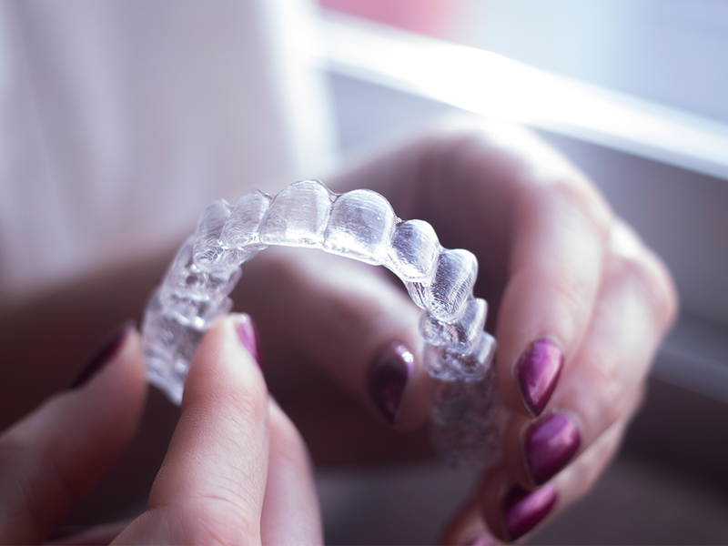Why This Top Dentist Sometimes Recommends Invisalign Instead of Porcelain Veneers