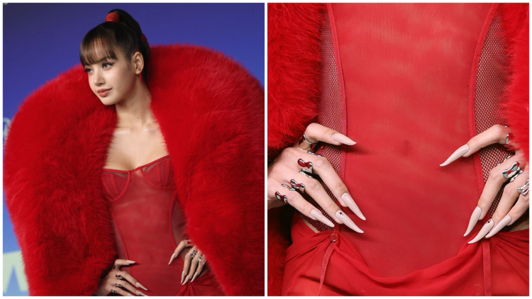 Blackpink's Lisa on the 2026 VMAs red carpet in a red fur-collared coat and sheer red gown, with a close-up of her curved, nude stiletto-shaped nails accented with small red gemstones and stacked metallic rings.