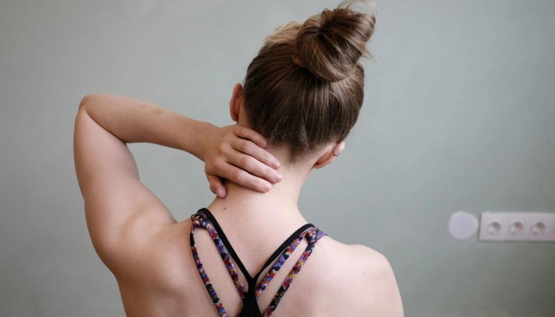 woman stretching her neck