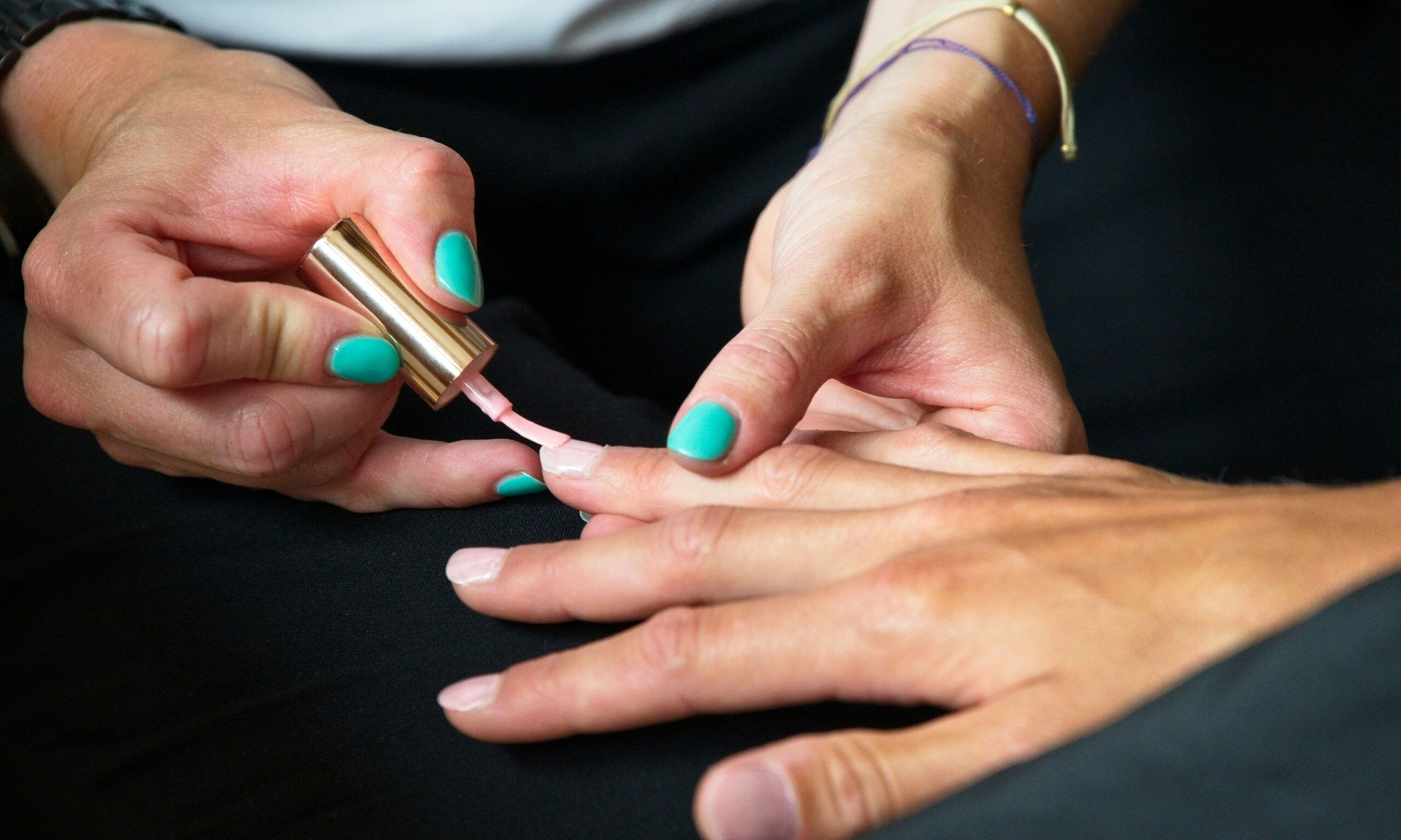 close up shot of woman getting a manicure
