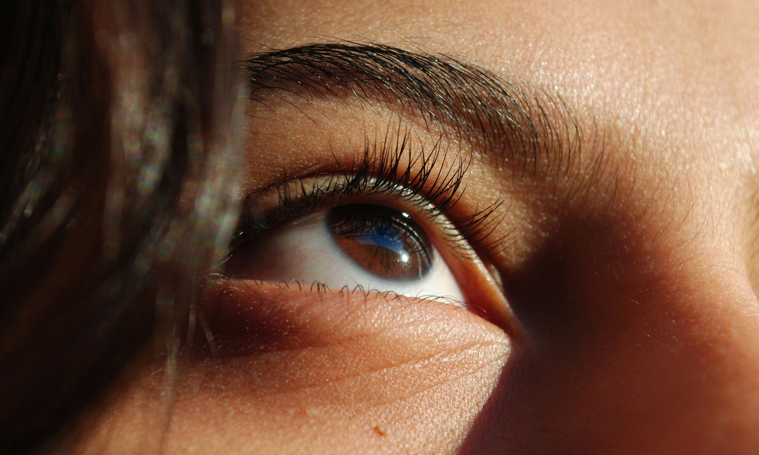 close up of woman's eye and eyelashes
