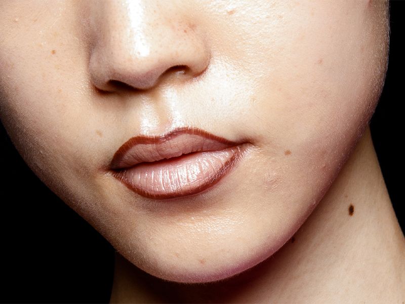 The Genius Reason Everyone Is Lining Their Lips With a Brow Pencil