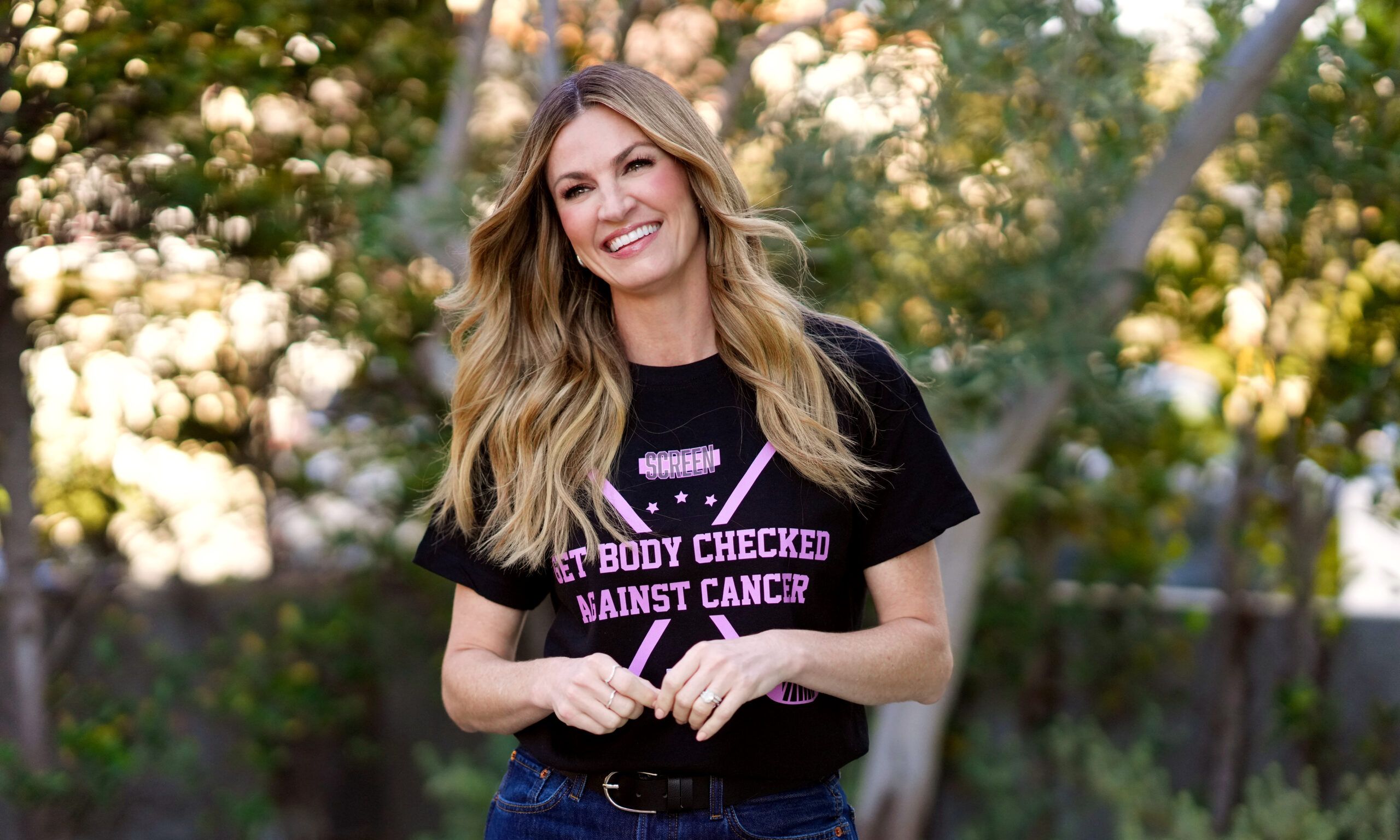 Erin Andrews wearing "Get Body Checked Against Cancer" t-shirt