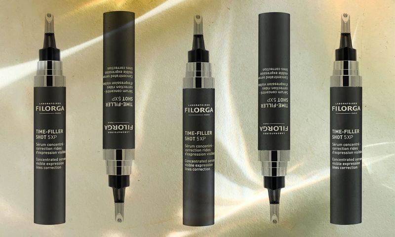 Bottles of Filorga Time-Shot Filler 5XP on shadowy background