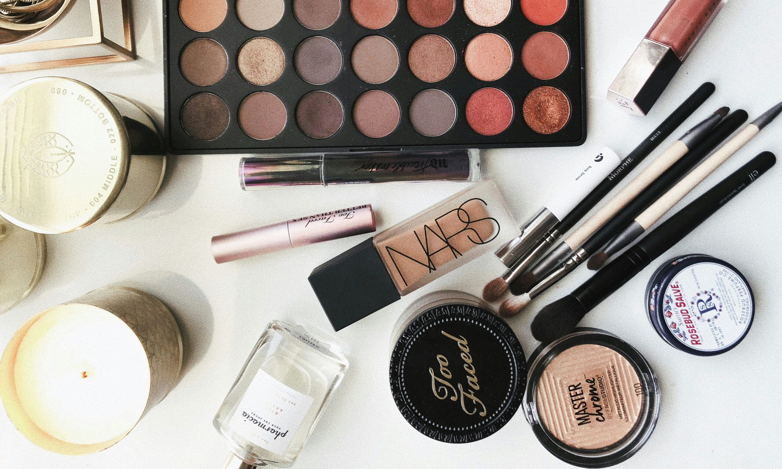 various makeup cosmetics on surface