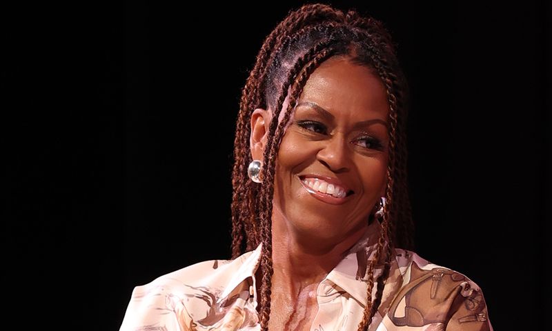 MARTHA'S VINEYARD, MASSACHUSETTS - AUGUST 09: Michelle Obama speaks during Higher Ground's "IMO with Michelle Obama &amp; Craig Robinson" podcast during 2025 Martha's Vineyard African American Film Festival at Martha's Vineyard Performing Arts Center on August 09, 2025 in Martha's Vineyard, Massachusetts.