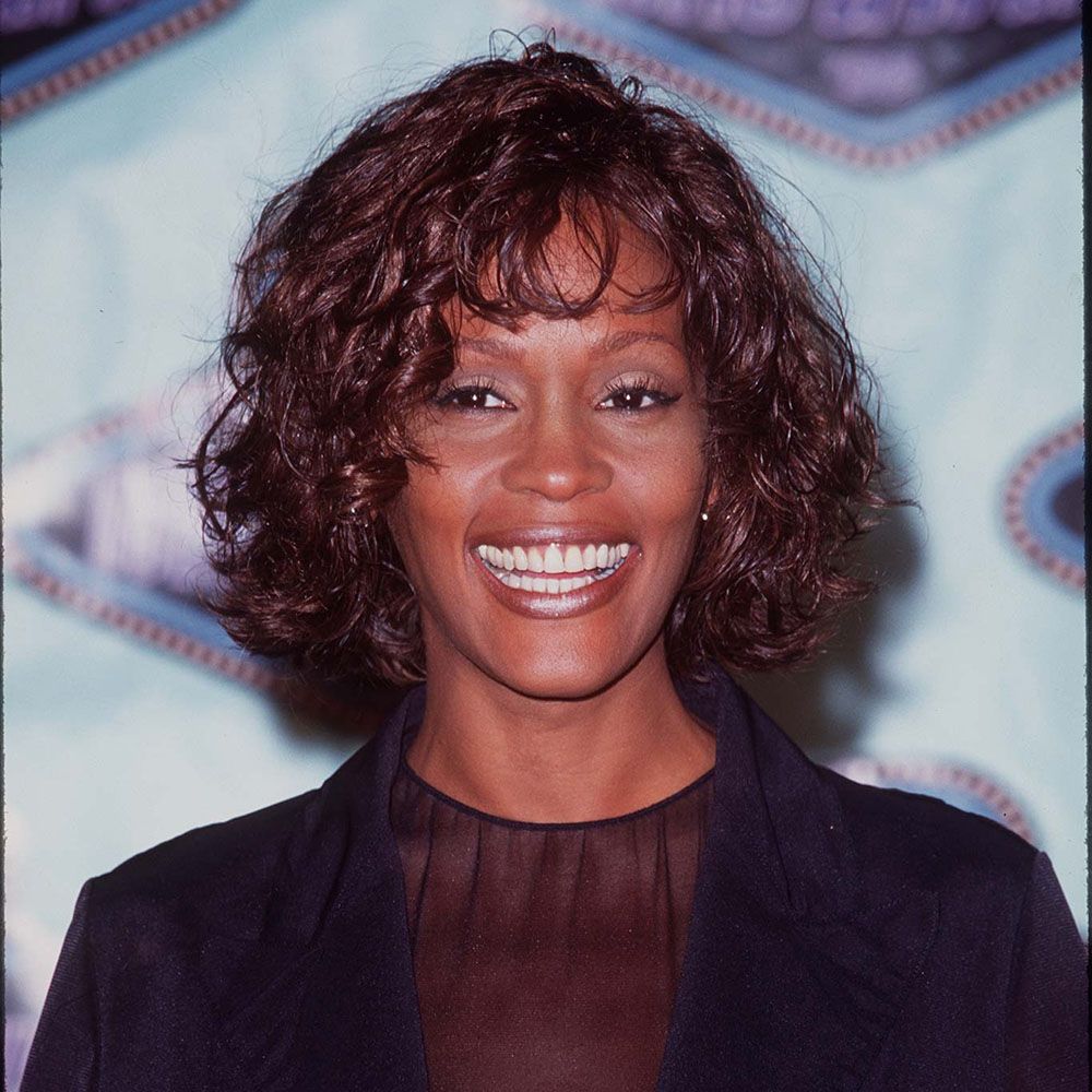 whitney houston curly shag