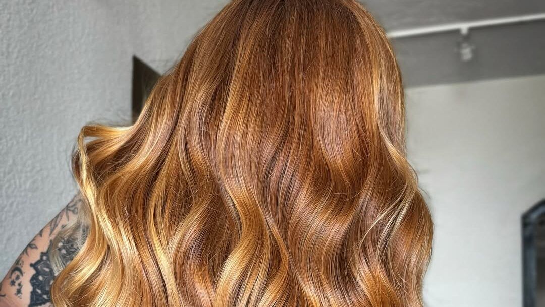 Long ginger copper red hair with loose waves