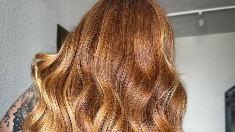 Long ginger copper red hair with loose waves
