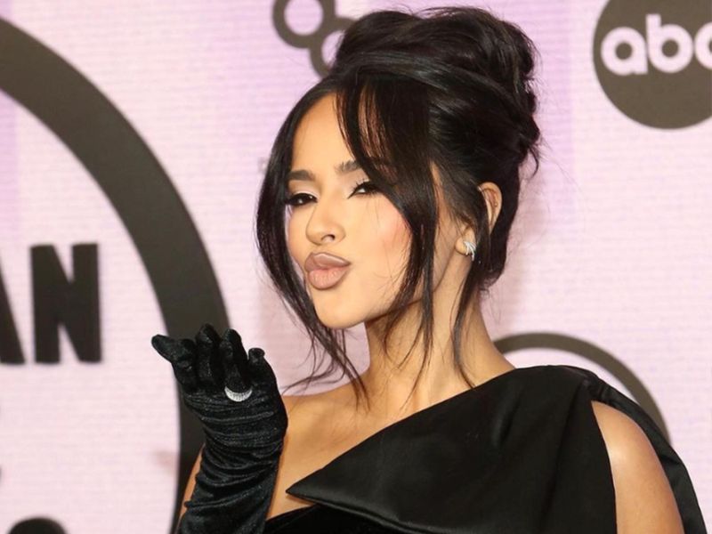 The Details Behind Becky G’s Faux Curtain Bangs at the American Music Awards