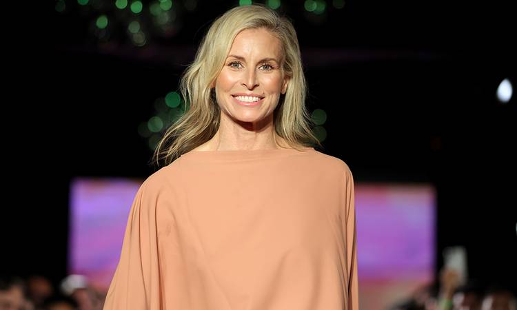 NEW YORK, NEW YORK - SEPTEMBER 18: Niki Taylor walks the runway at the Coolibar Mott50 Edition Sun Safe Soirée Fashion Presentation on September 18, 2025 in New York City.