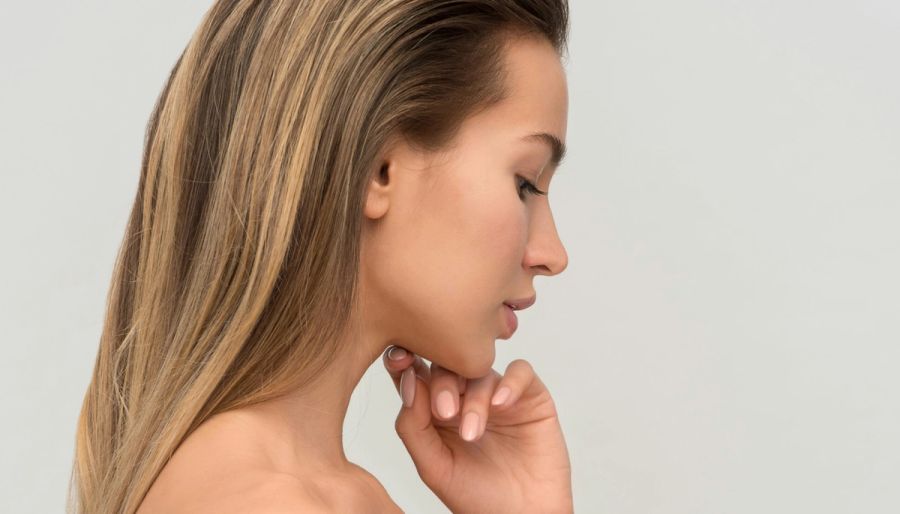 woman touching her skin