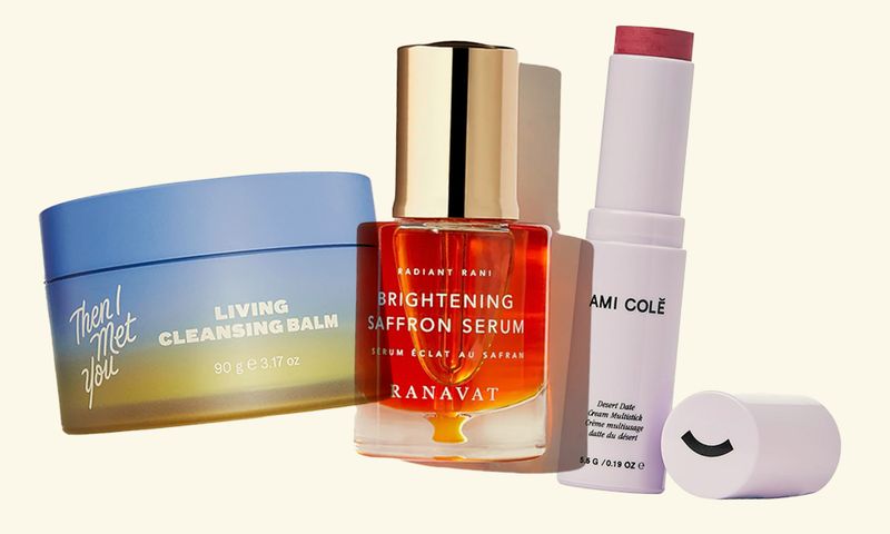 indie beauty products on pale yellow background