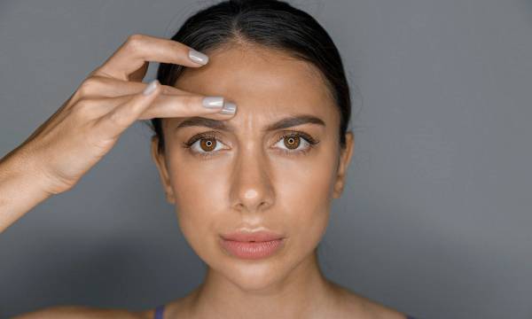 Beautiful healthy smiling caucasian woman is doing beauty procedures at spa and healthcare salon
