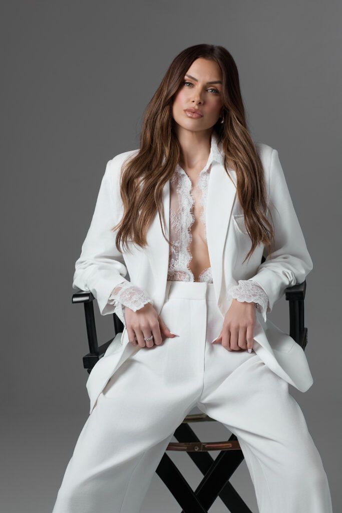 Lala Kent in white suit