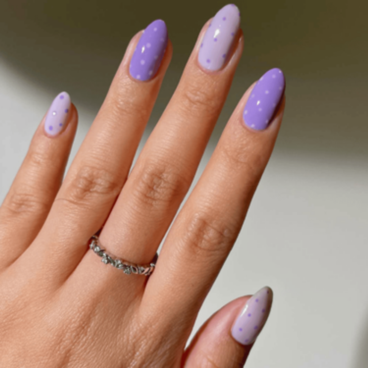 Purple polka dot nails