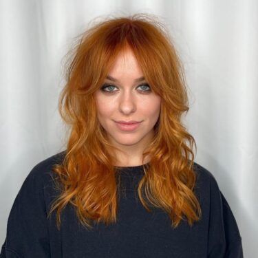 Medium-length shoulder haircut with shaggy style