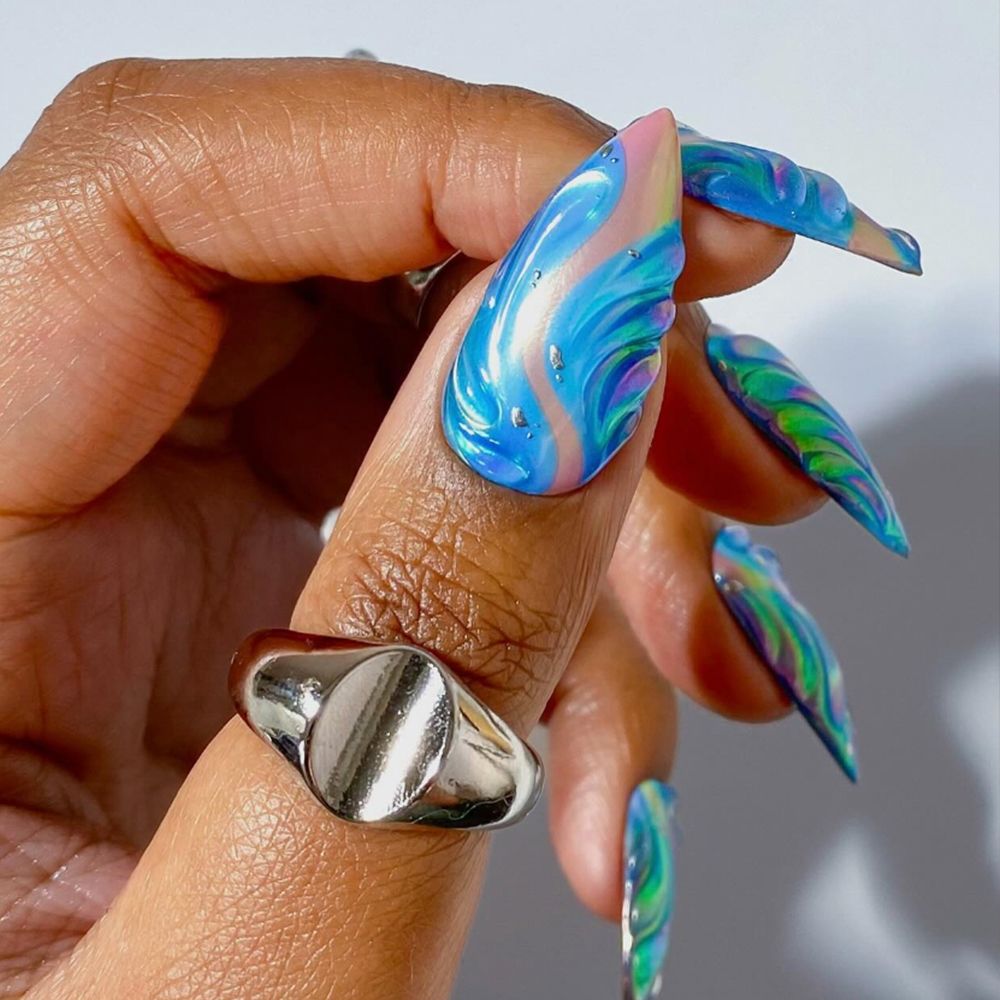 blue swirl stiletto nails