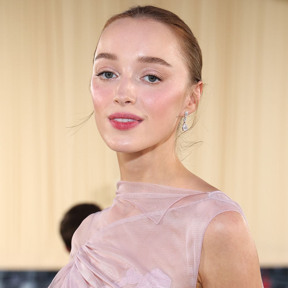 Phoebe Dynevor attends the 2024 Met Gala in pink dress