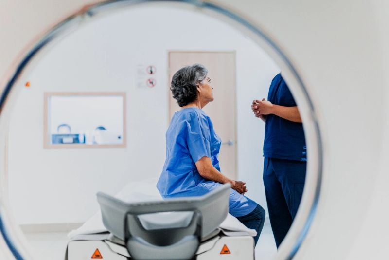 Patient preparing for an MRI scan in a clinical setting, illustrating full-body imaging and preventive health screenings