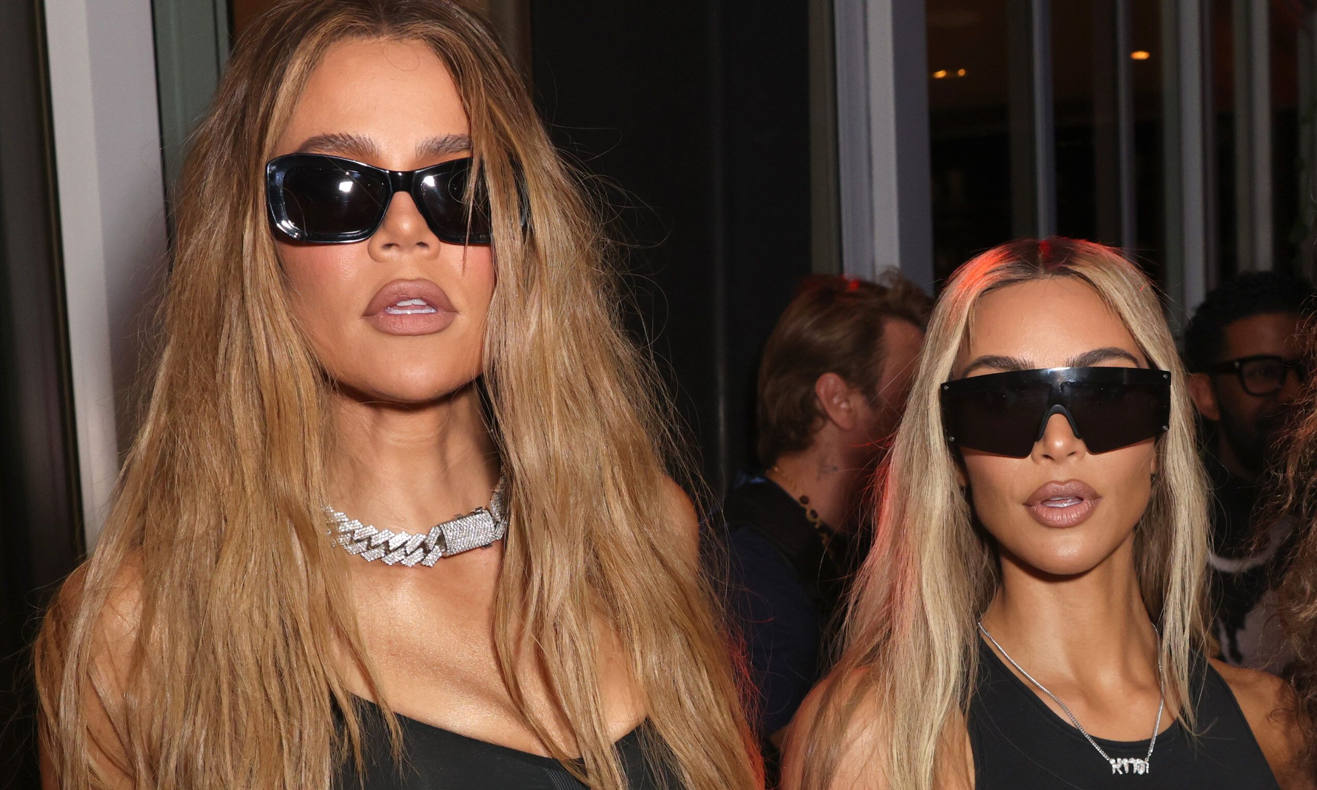 Khloe Kardashian and Kim Kardashian attend as Travis Scott and 50 Cent perform at Wayne &amp; Cynthia Boich's Art Basel Party on December 02, 2022 in Miami Beach, Florida.