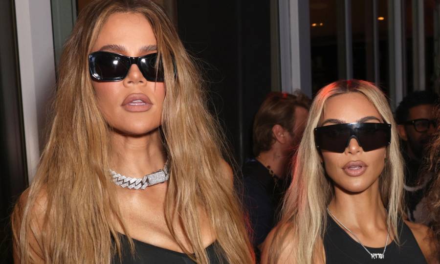 Khloe Kardashian and Kim Kardashian attend as Travis Scott and 50 Cent perform at Wayne & Cynthia Boich's Art Basel Party on December 02, 2022 in Miami Beach, Florida.