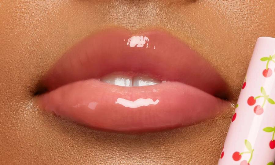 Tarte cherry lip gloss on lips