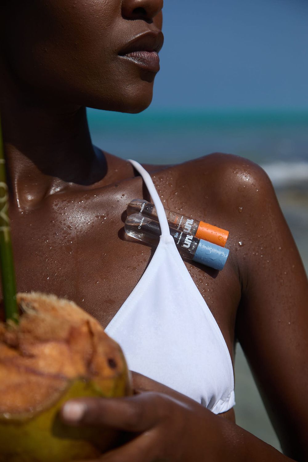 uni-water-based-travel-perfumes-on-woman