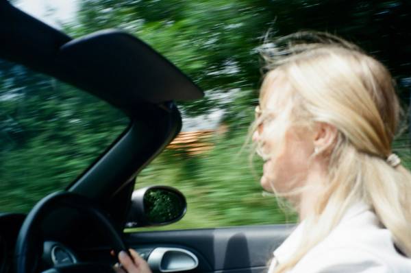 woman driving in sunshine