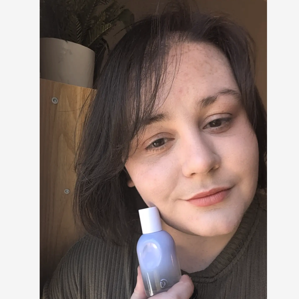 Rowan Lynam holds Glossier You Fleur