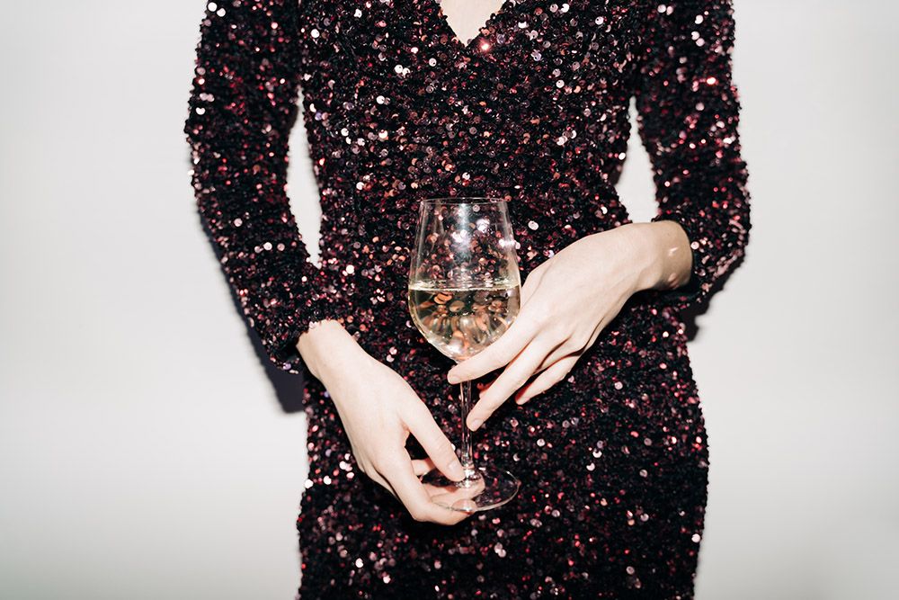 Close up of woman hands with champagne glass