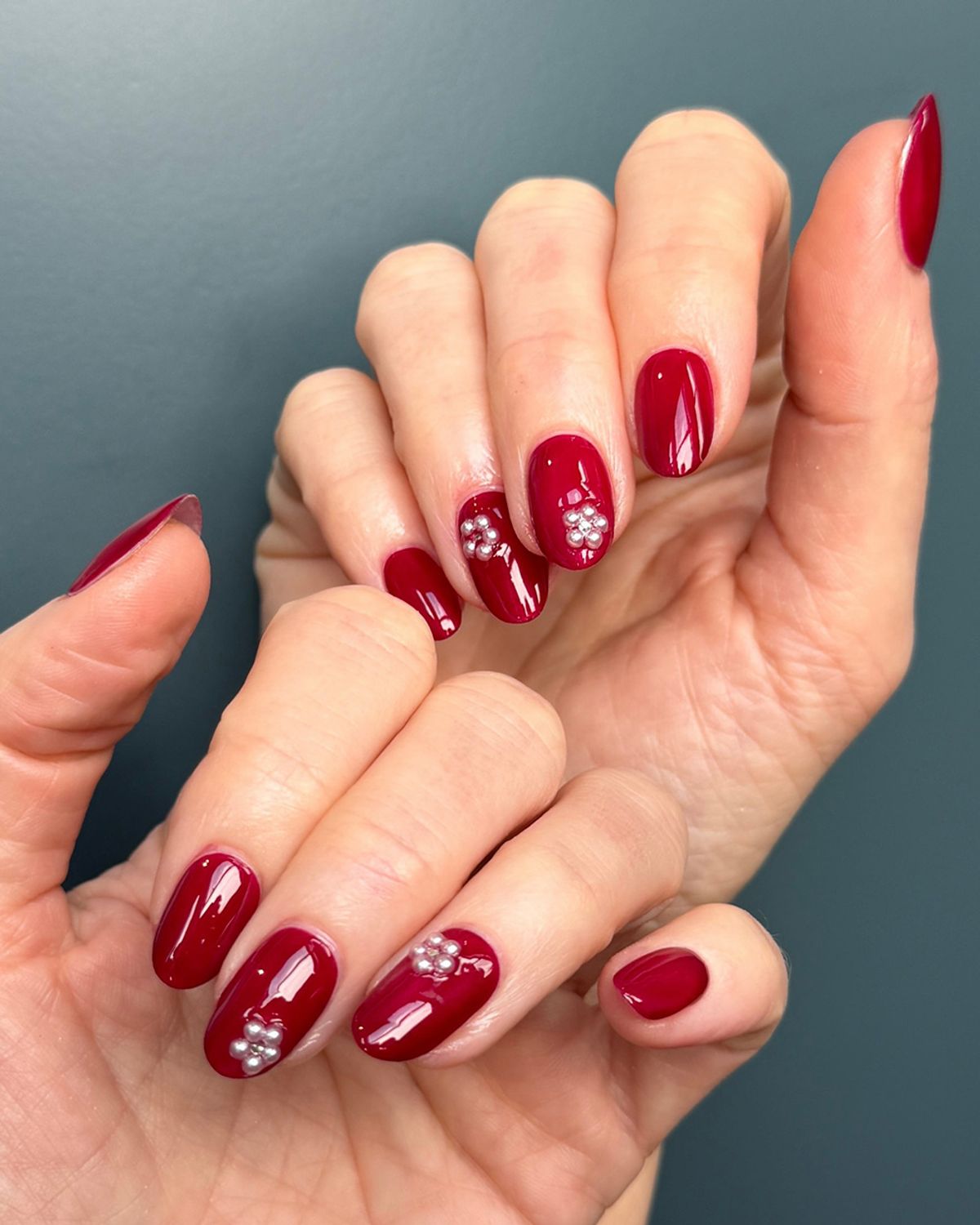 Emily Blunt red floral nails