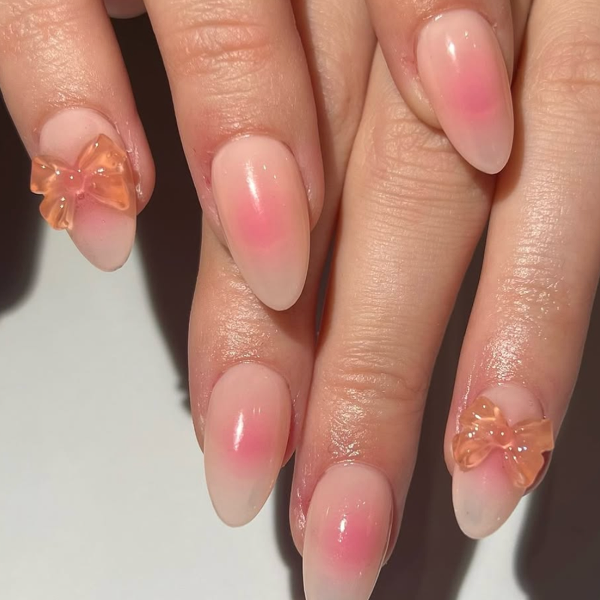 pink aura bow nails