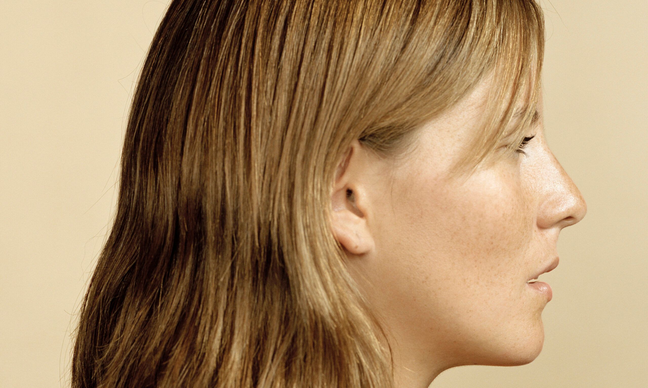 Young woman of hispanic descent, profile, head and shoulders