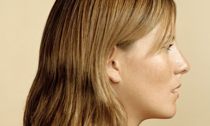 Young woman of hispanic descent, profile, head and shoulders