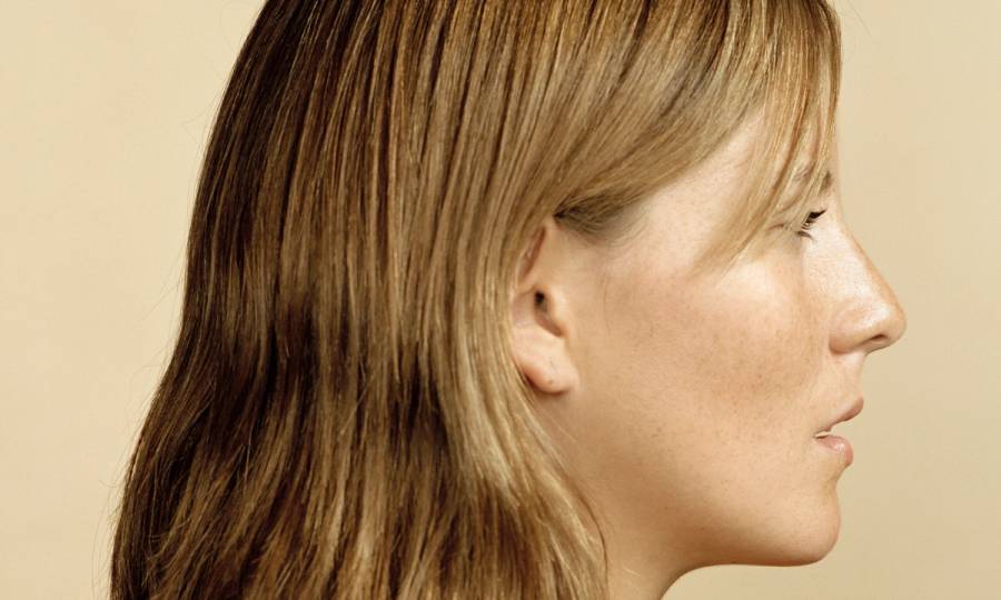 Young woman of hispanic descent, profile, head and shoulders