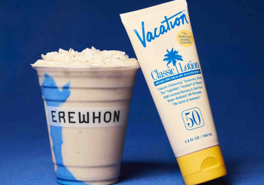 Vacation and Erewhon Sunscreen Smoothie Three beside a tube of Vacation Classic Lotion SPF 50 on a blue background