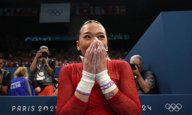 Suni Lee of Team United States celebrates winning the Bronze medal during the Artistic Gymnastics Women's Uneven Bars Final on day nine of the Olympic Games Paris 2024