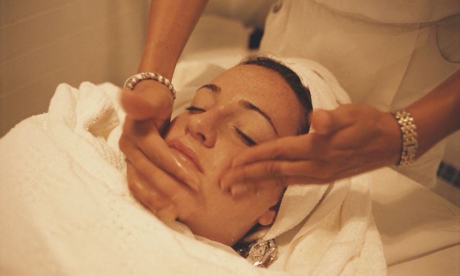 A woman receiving a facial spa treatment, Bonaire, Netherlands, March 2000.
