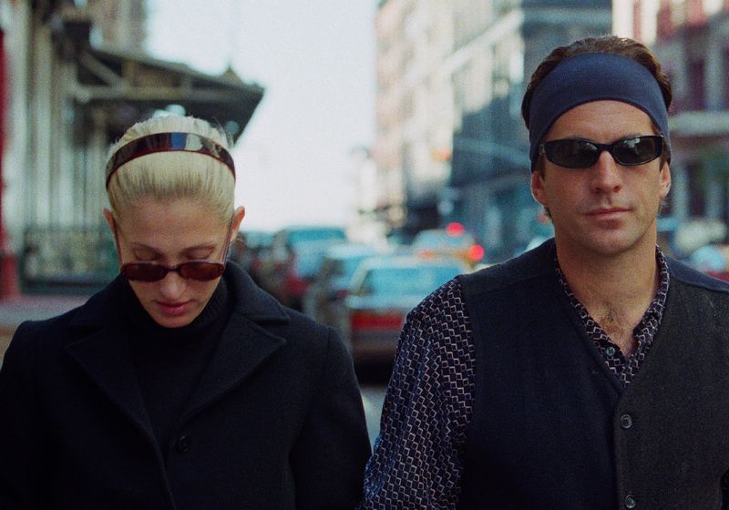 John Kennedy, Jr. and his wife, Carolyn Bessette-Kennedy wearing hair accessories in New York City