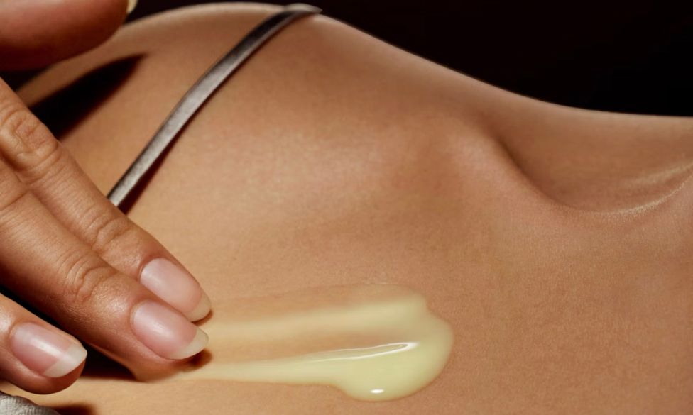 cream on collarbone area