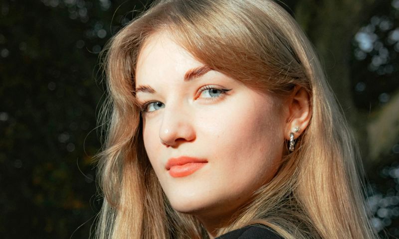 woman with milk latte color hair