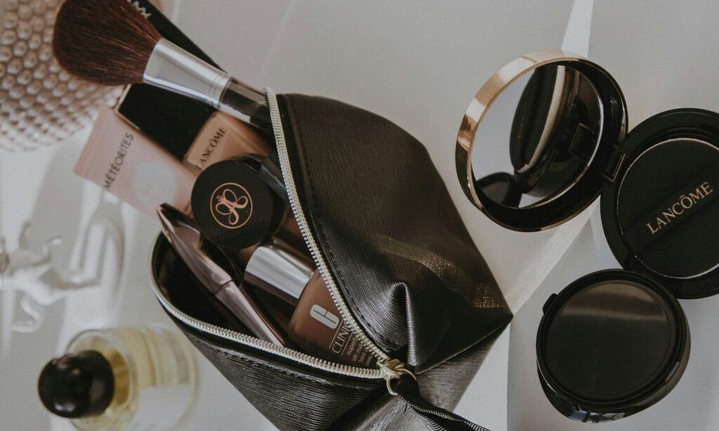 cosmetics in black cosmetics bag